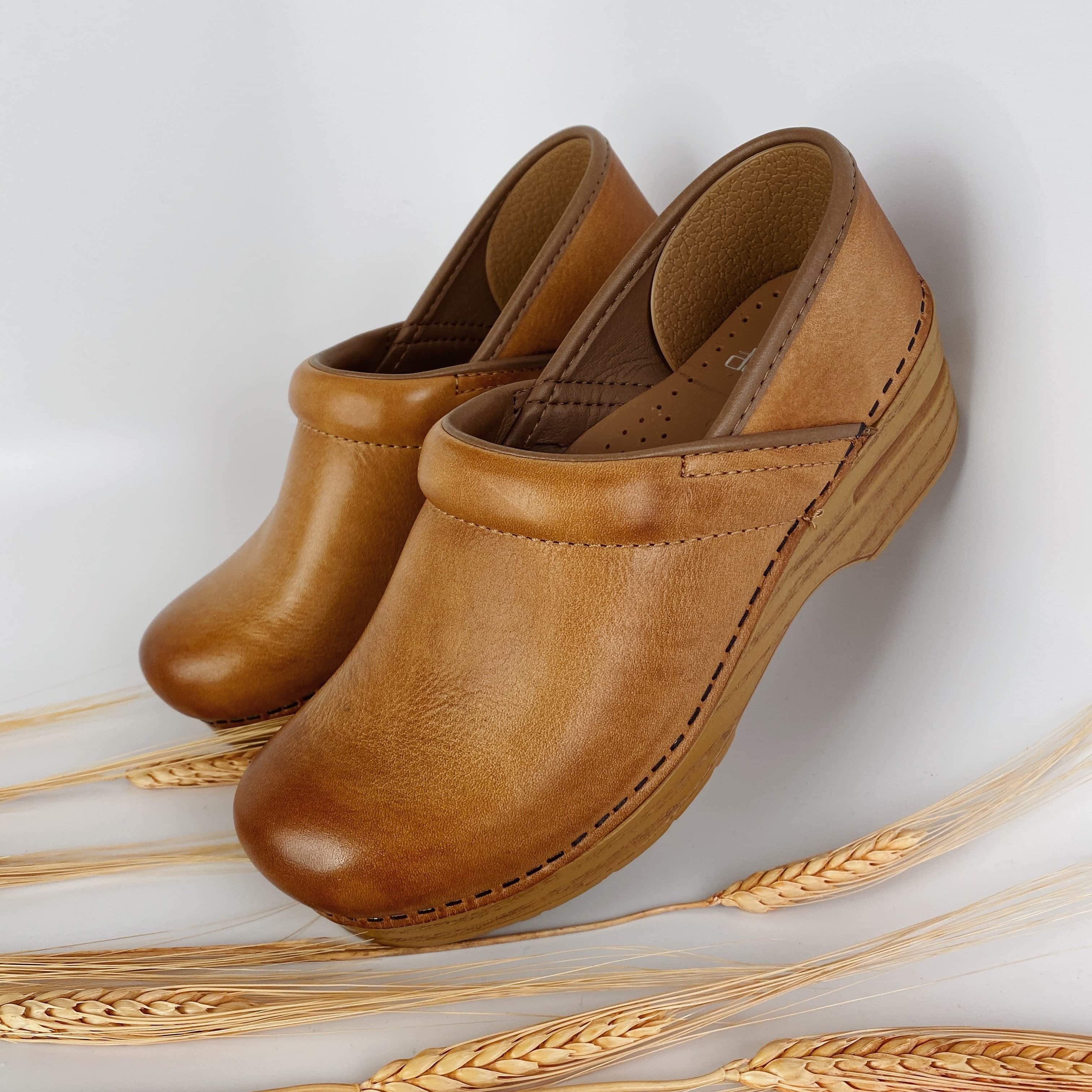 Dansko store honey clogs